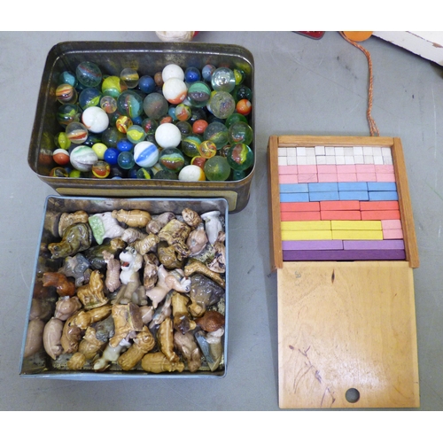 180 - Vintage toys: to include 'Ernest the Balancing Bear'; marbles and a Pelham puppet 'Pinocchio'