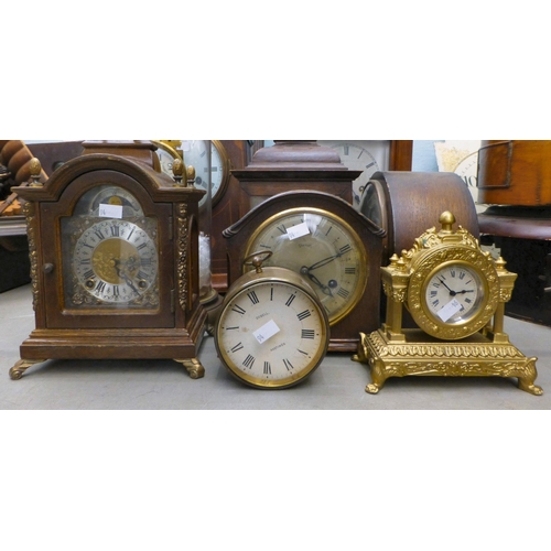 94 - Clockmakers spares and repairs: to include early 20thC, variously cased mantel clock cases&nbsp; lar... 