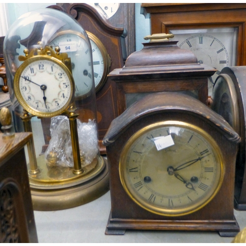 94 - Clockmakers spares and repairs: to include early 20thC, variously cased mantel clock cases&nbsp; lar... 