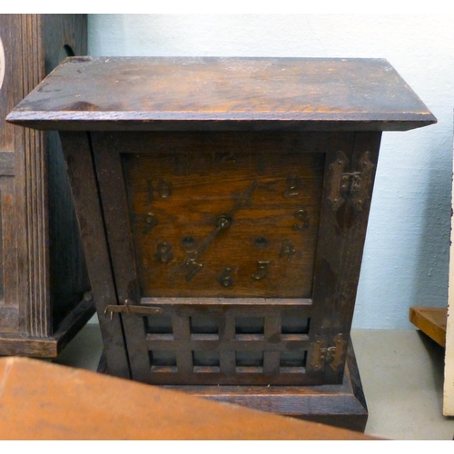 94 - Clockmakers spares and repairs: to include early 20thC, variously cased mantel clock cases&nbsp; lar... 