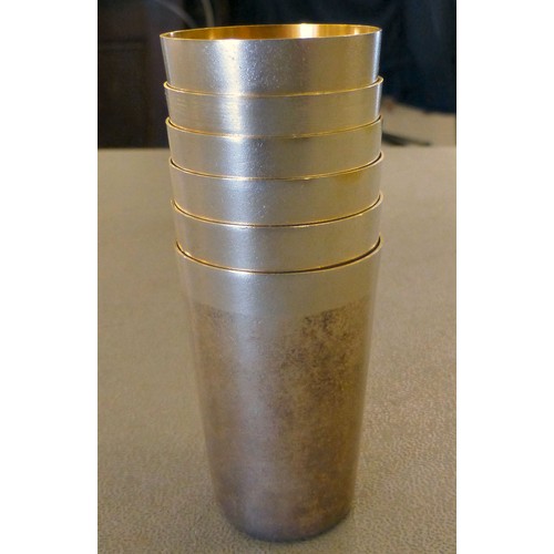 145 - Six silver gilt tot cups  stamped 875  (combined gross weight 140grms)