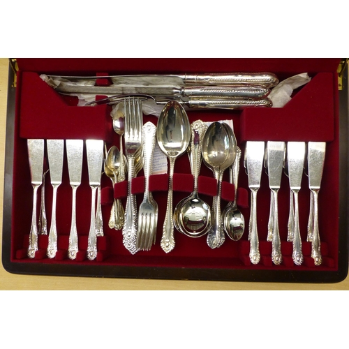 A George Butler silver plated canteen of Herringbone pattern cutlery ...