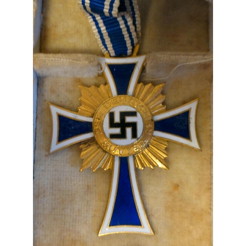 61 - German collectables, some replicas: to include a Mother's Cross of Honour(Please Note: this lot is s... 