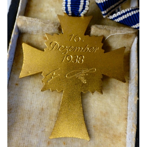61 - German collectables, some replicas: to include a Mother's Cross of Honour(Please Note: this lot is s... 