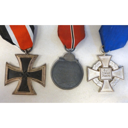 61 - German collectables, some replicas: to include a Mother's Cross of Honour(Please Note: this lot is s... 