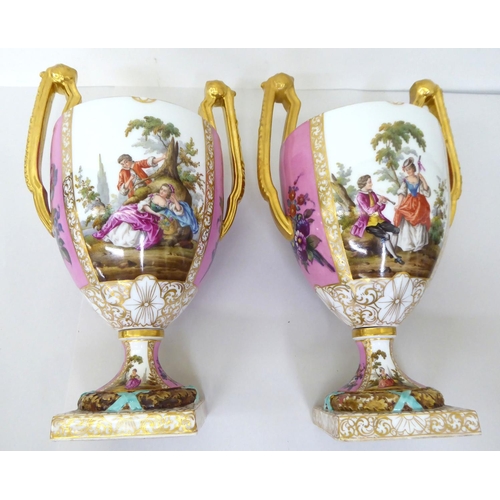 17 - A pair of Augustus Rex porcelain pedestal vases and covers, painted and hand finished, decorated wit... 