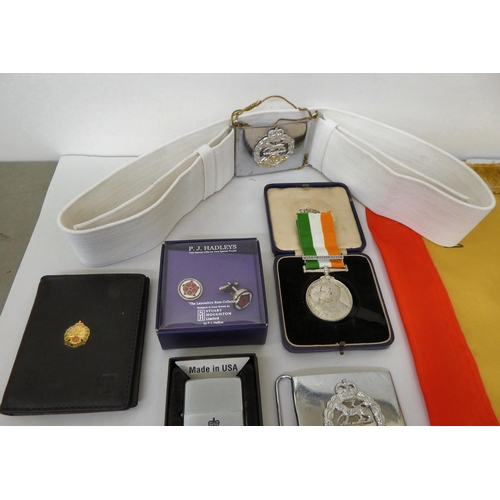 28 - Mainly Hampshire related militaria: to include a bayonet; printed sash; badges; buttons; and similar... 