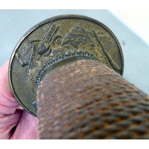 29 - A Japanese kutana with a simulated shagreen effect grip, cast metal tsuba and 29