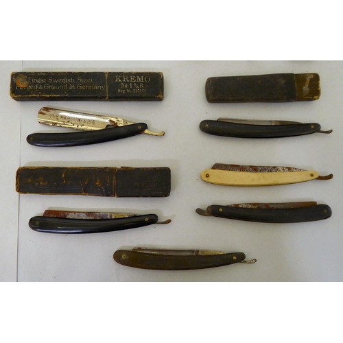 30 - 20thC hand-held collectables: to include corkscrews; cut throat razors; and pocket lighters