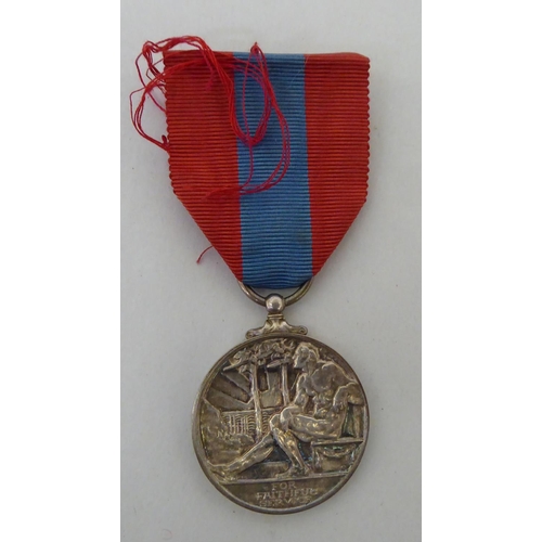 37 - Medals and badges: to include an Imperial Service medal, awarded to one Joseph Briscoe(Please Note: ... 