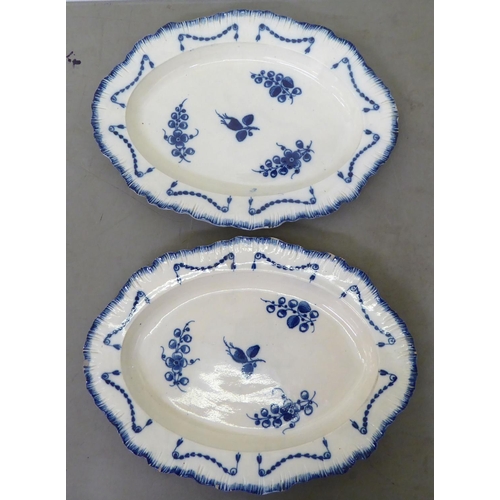 42 - Two late 18thC pearlware, oval serving dishes, decorated with a ribbon border  18