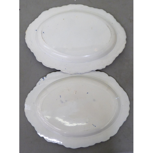 42 - Two late 18thC pearlware, oval serving dishes, decorated with a ribbon border  18
