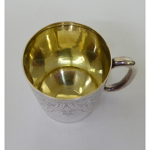 52 - A Hukin & Heath floral engraved silver tankard  London 1888  3.25