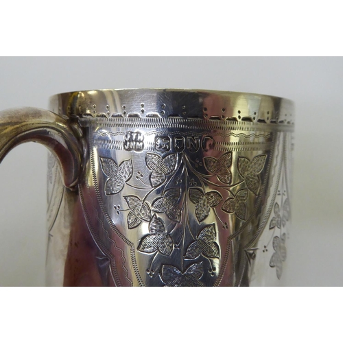 52 - A Hukin & Heath floral engraved silver tankard  London 1888  3.25