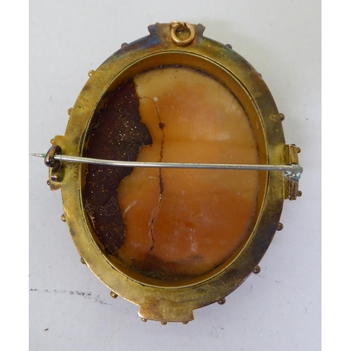 55 - A late Victorian decorative and later gilt metal framed cameo brooch