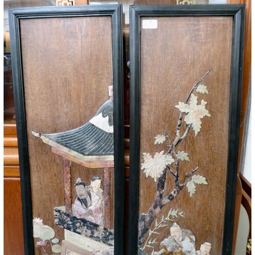 1 - A pair of 20thC Oriental coloured hardstone inlaid, hardwood panels, depicting elders in a landscape... 