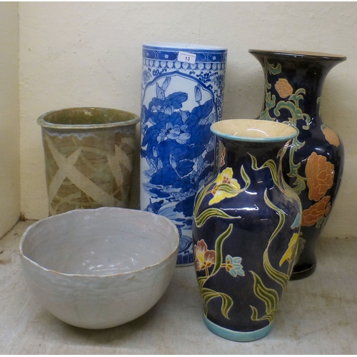 13 - Interior designer accessories: to include a modern china, cylindrical stickstand, decorated in blue ... 