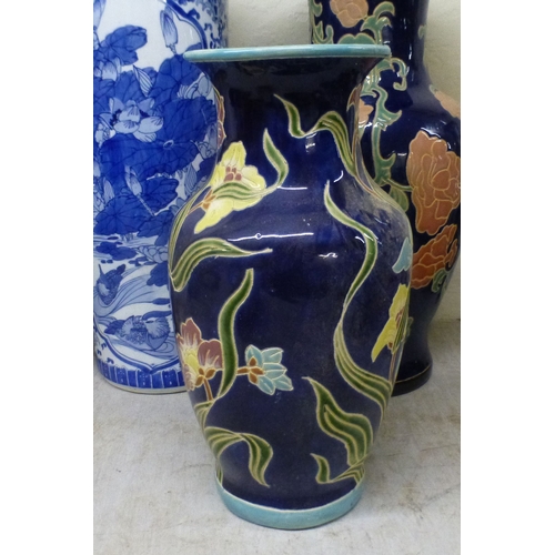 13 - Interior designer accessories: to include a modern china, cylindrical stickstand, decorated in blue ... 