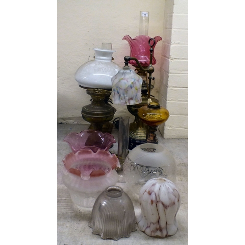 19 - Interior lighting: to include early 20thC oil lamps (converted to electricity)&nbsp; largest 26