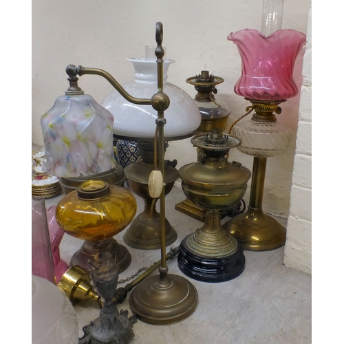 19 - Interior lighting: to include early 20thC oil lamps (converted to electricity)&nbsp; largest 26