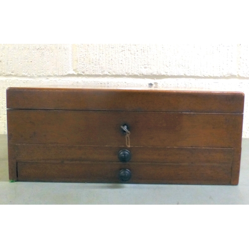 29 - A late Victorian mahogany physician/doctor's box with a hinged lid and two drawers, containing medic... 