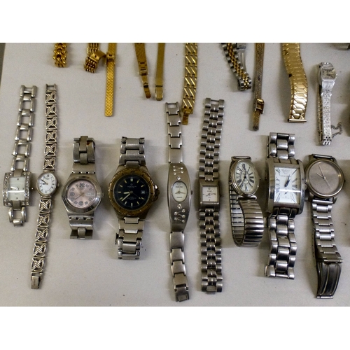 35 - Ladies and gentlemen's wristwatches  variously cased and strapped