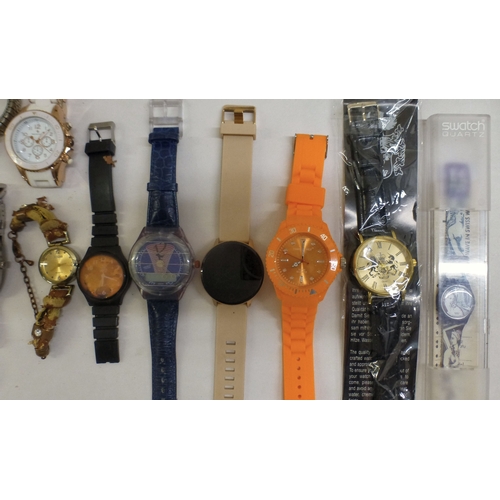35 - Ladies and gentlemen's wristwatches  variously cased and strapped