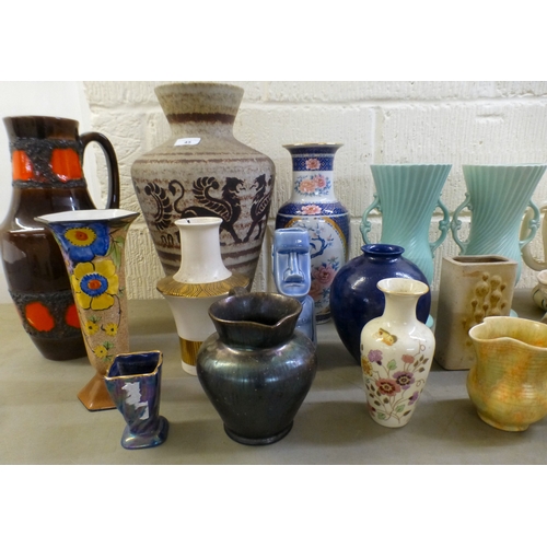 45 - Decorative ceramics: to include a Crown Devon Memphis pattern vase  8.5