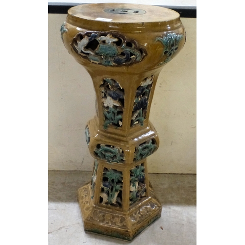 52 - A 20thC Chinese inspired pottery jardini&egrave;re with pierced and painted features&nbsp; 30