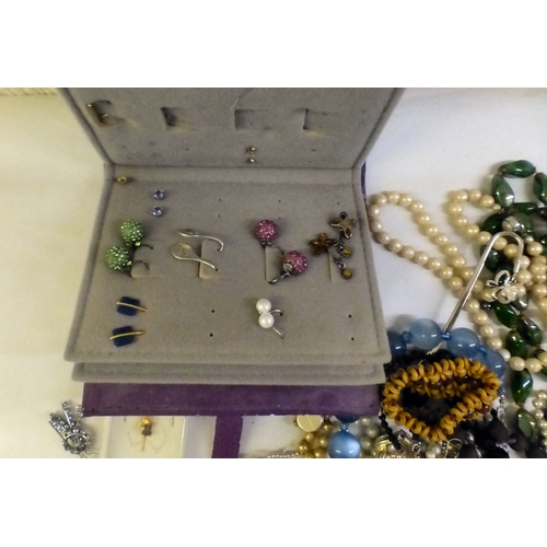 57 - Costume jewellery: to include bead necklaces