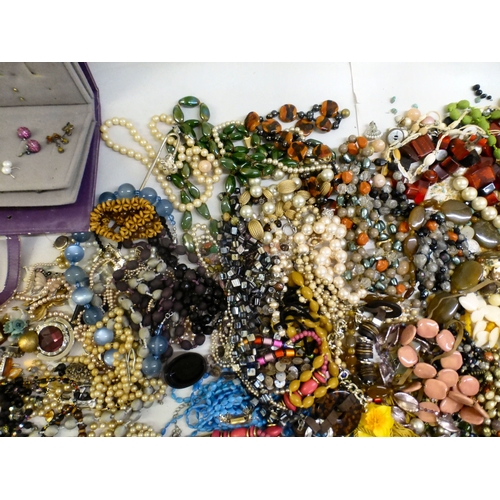 57 - Costume jewellery: to include bead necklaces