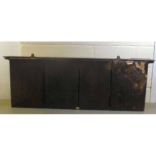 6 - A late 19thC gilt painted, inverted breakfront mirror, the three section plate set between pillar or... 