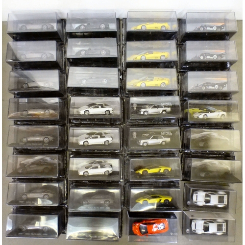 Approx. thirty-two cased model vehicles, various makes and scales: to ...