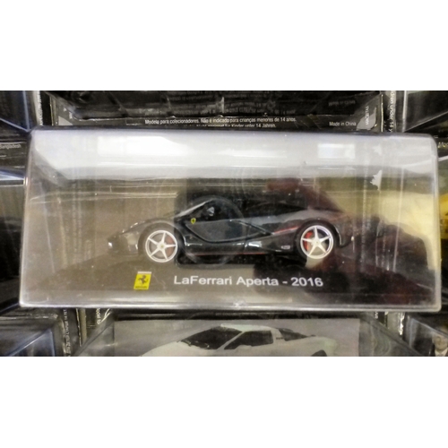 Approx. thirty-two cased model vehicles, various makes and scales: to ...