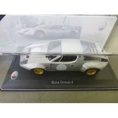Approx. thirty-two cased model vehicles, various makes and scales: to ...