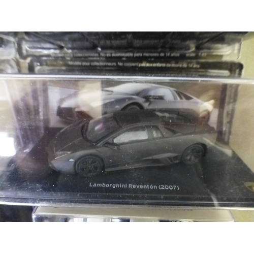 Approx. thirty-two cased model vehicles, various makes and scales: to ...