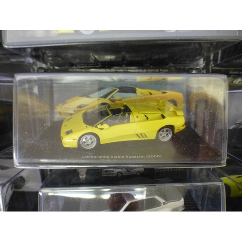 Approx. thirty-two cased model vehicles, various makes and scales: to ...