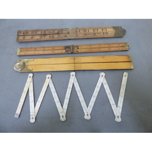 A mixed lot: to include a Cartier pocket lighter; metric rulers ...