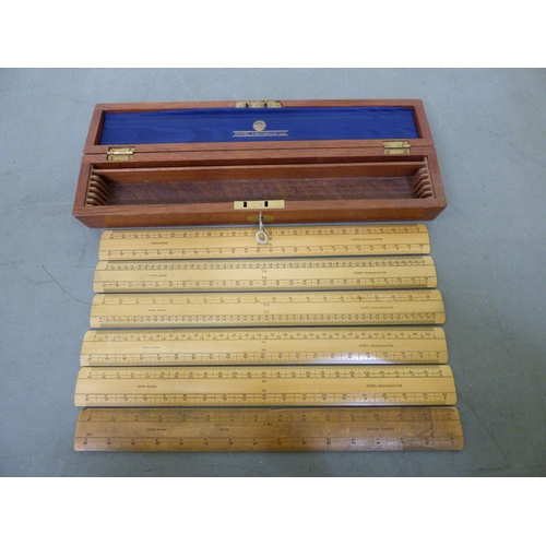 A mixed lot: to include a Cartier pocket lighter; metric rulers ...