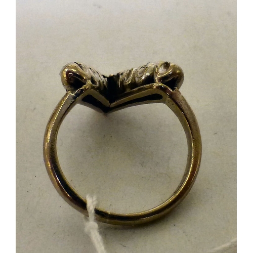 An 18ct white gold 'V' design ring, set with diamonds (approx. 3.8grms)