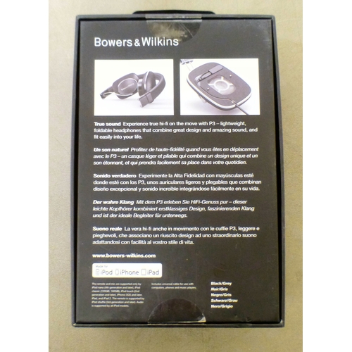 111 - A pair of Bawers & Wilkins P3 headphones  boxed; and a SUI Artemide desk lamp  16