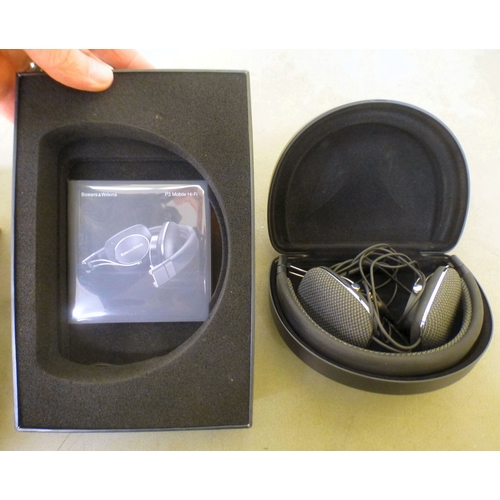 111 - A pair of Bawers & Wilkins P3 headphones  boxed; and a SUI Artemide desk lamp  16