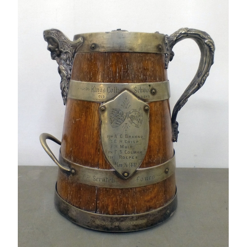 124 - A mixed lot: to include a late Victorian silver, later clad, oak jug  12