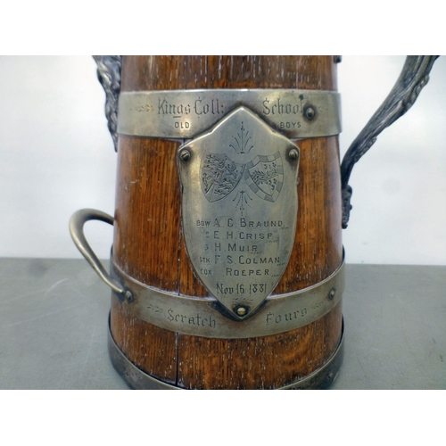 124 - A mixed lot: to include a late Victorian silver, later clad, oak jug  12