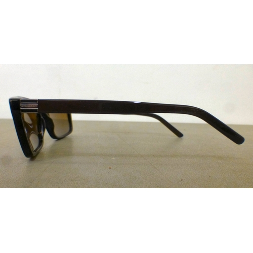 128 - Three pairs of sunglasses: to include a pair by Burberry  cased