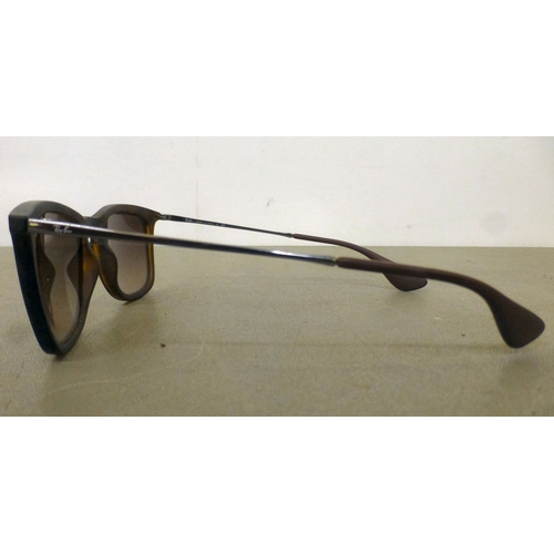 128 - Three pairs of sunglasses: to include a pair by Burberry  cased
