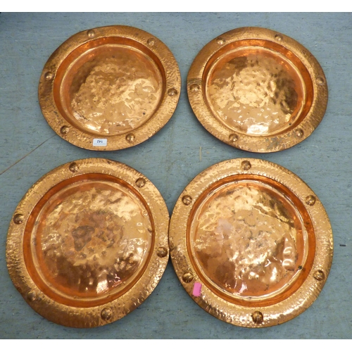 142 - Metalware: to include four Arts & Crafts inspired Lombard copper chargers&nbsp; 17