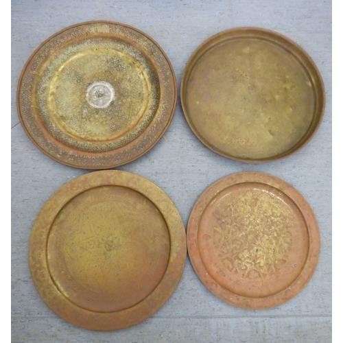 142 - Metalware: to include four Arts & Crafts inspired Lombard copper chargers&nbsp; 17
