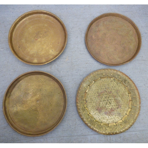 142 - Metalware: to include four Arts & Crafts inspired Lombard copper chargers&nbsp; 17
