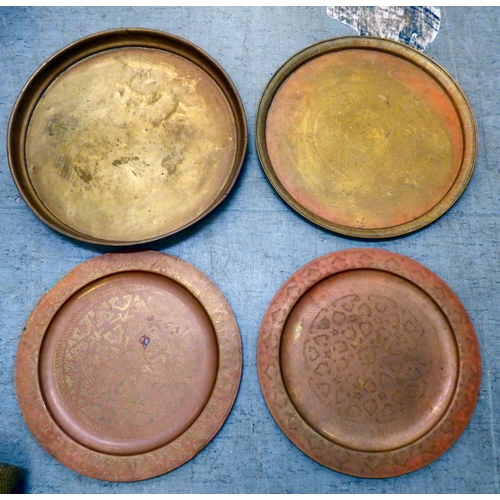143 - Metalware: to include early/mid 20thC copper and brass, variously decorated tray tops&nbsp; largest ... 